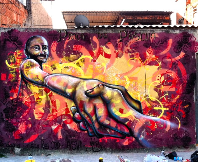 Rio de Janeiro, Brazil 2013: Joel regularly leads youth mural projects in the City of God (Cidade de Deus) community in collaboration with the youth NGO ASVI, organized by the Paróchia Anglicana Cidade de Deus