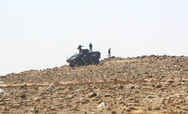 Soldiers with tanks are stationed around the camp to prevent refugees from leaving (photo by Max Frieder)